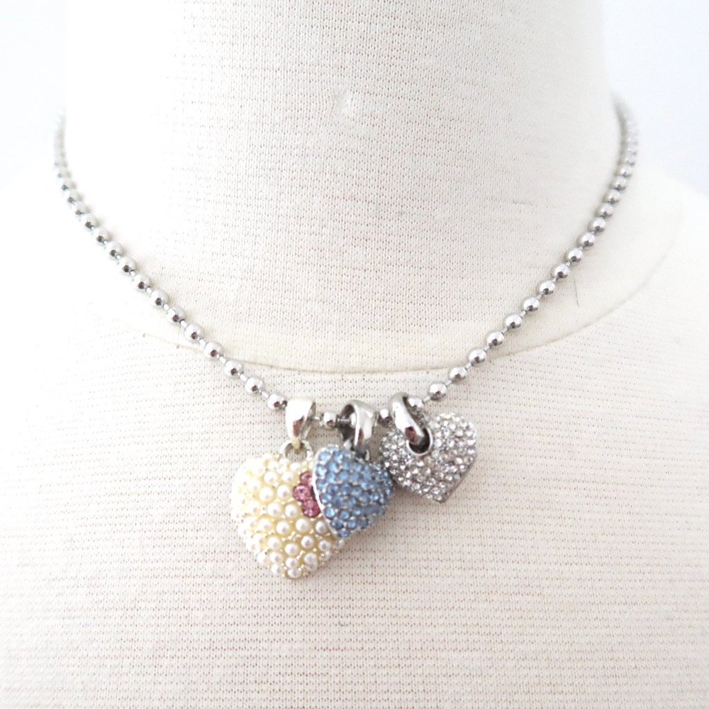 JANUS triple heart necklace